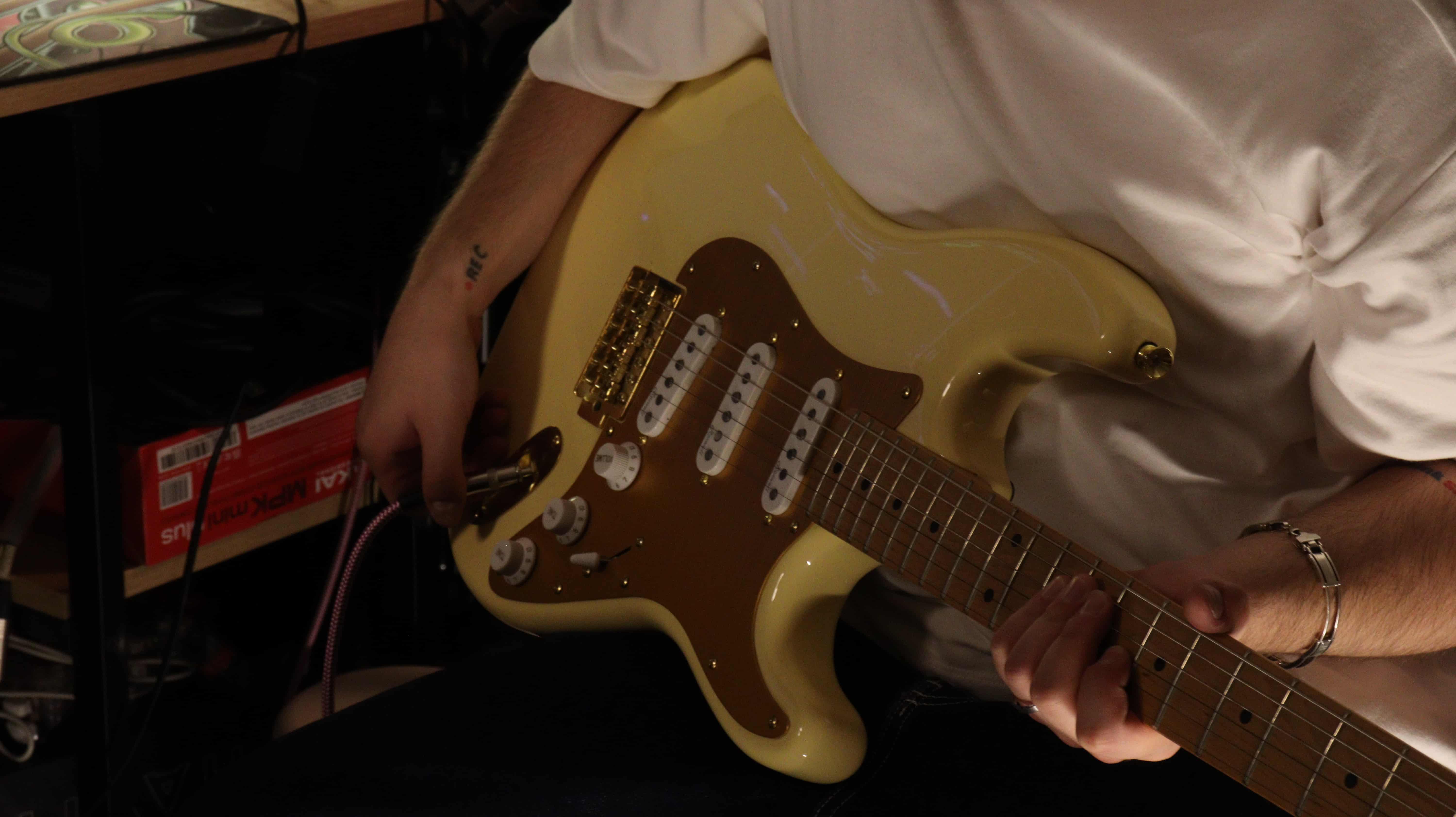 Detail of a guitar mid-session